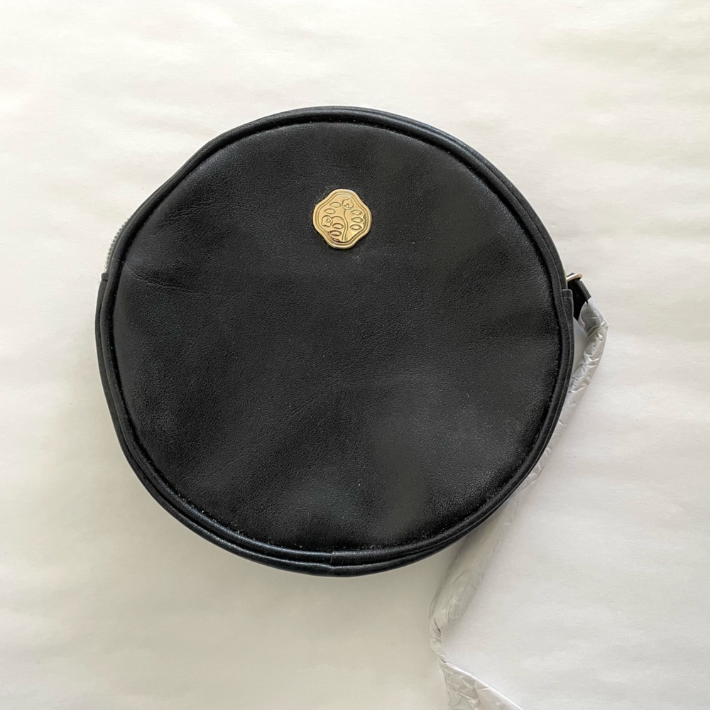 Shiseido black round cosmetic bag